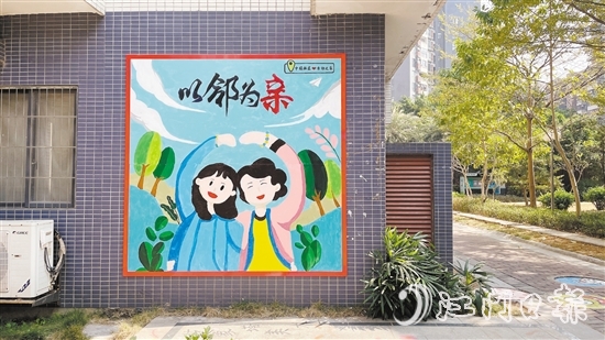 志愿者们合力绘制的墙画。