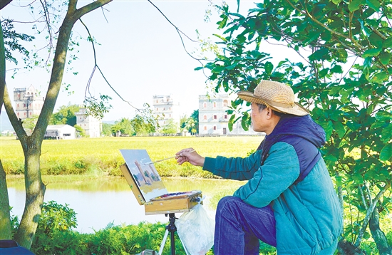 海内外美术家在塘口镇自力村碉楼群写生。 海内外美术家在塘口镇自力村碉楼群写生。